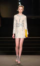 <b>London Fashion Week AW13: Sass & Bide <br></b><br>Dresses were adorned with laser cut-outs.<br><br>© Getty