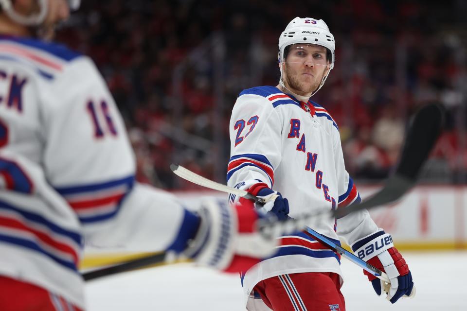 WASHINGTON, DC - JANUARY 13: Adam Fox #23 of the New York Rangers looks on against the Washington Capitals during the third period at Capital One Arena on January 13, 2024 in Washington, DC.