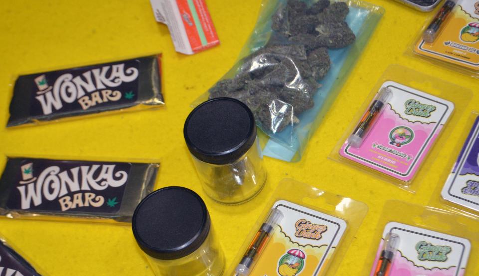 Marijuana in various forms, including dried flower, edibles and concentrates, is displayed for sale at a black market "pop-up" event.