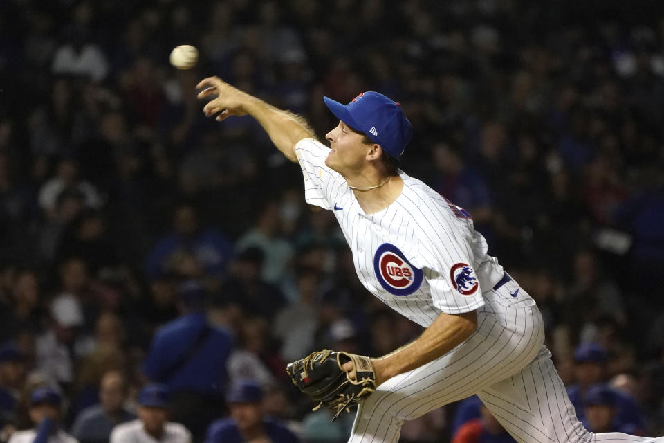 Chicago Cubs relief pitcher Hayden Wesneski delivers in his Major League debut during the fifth inning of a baseball game against the Cincinnati Reds Tuesday, Sept. 6, 2022, in Chicago. (AP Photo/Charles Rex Arbogast)
