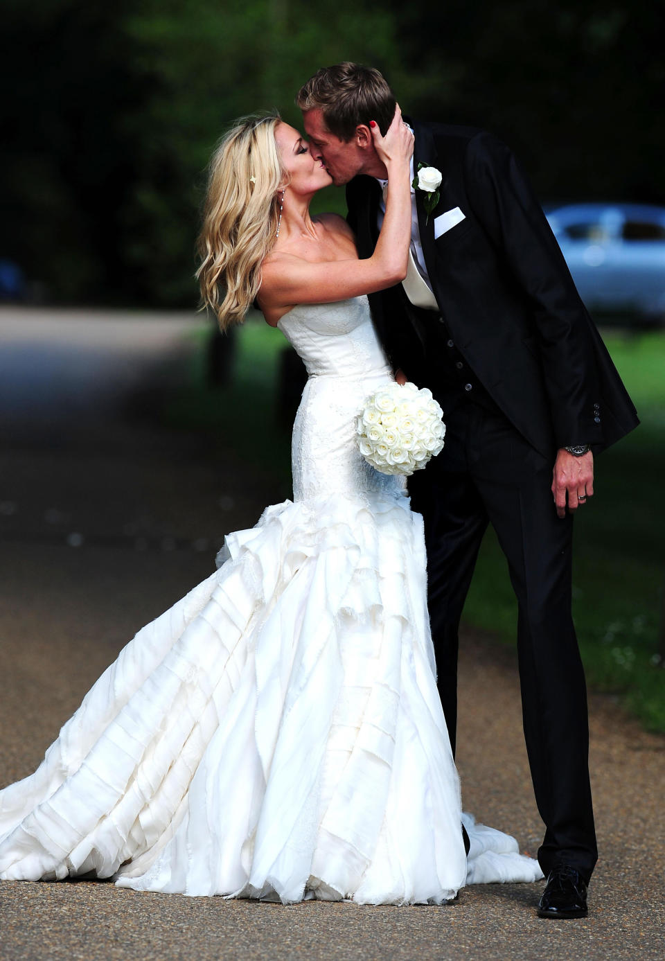 Footballer Peter Crouch and model Abbey Clancy in the grounds of Stapleford Park in Leicester following their wedding.
