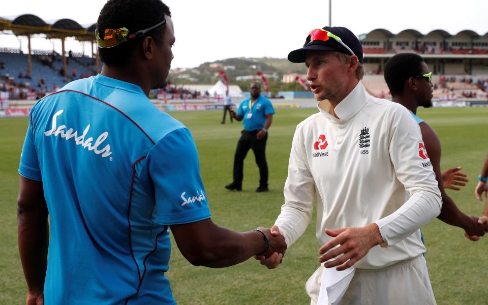 Shannon Gabriel and Joe Root shake hands after the third Test - Action Images via Reuters