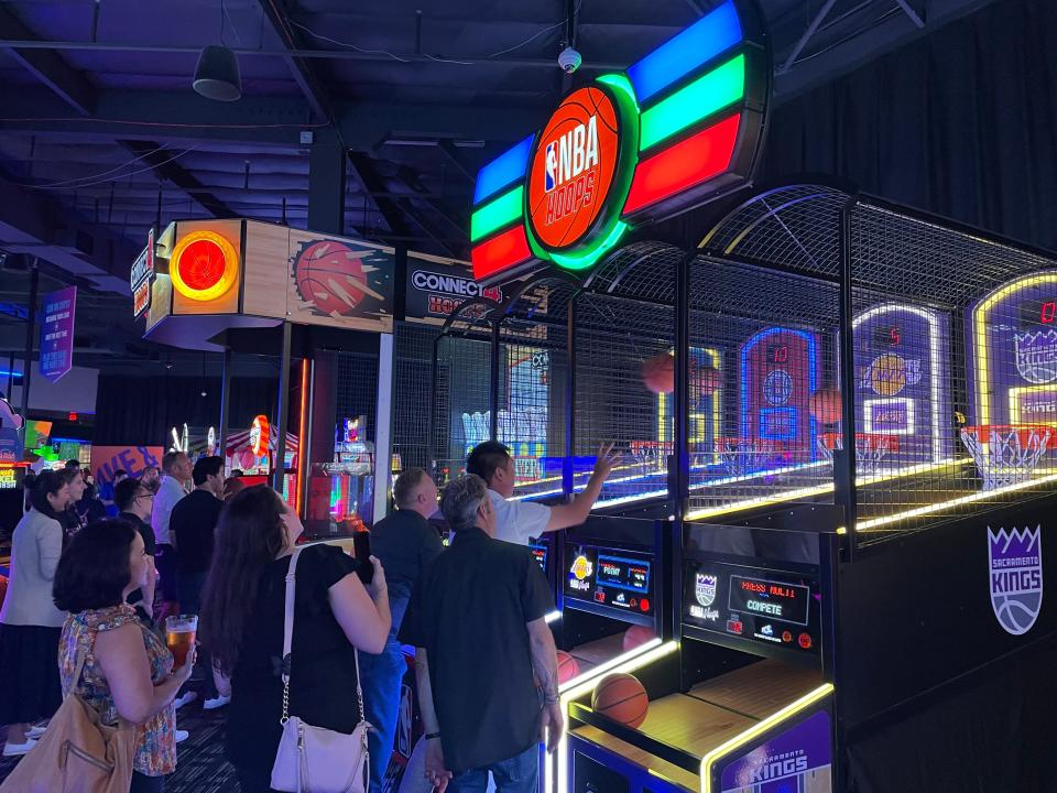 People gather to play NBA Hoops at the Rancho Mirage Dave & Buster's on Thursday, Sept. 14, 2023.