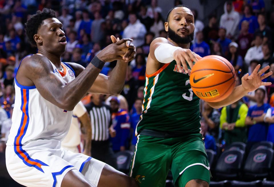 Florida Gators forward Tyrese Samuel (4) has the ball stolen by Florida A&M Rattlers guard Morrell Schramm (3). The Florida men’s basketball team hosted Florida A&M at Exactech Arena at the Stephen C. O’Connell Center in Gainesville, FL on Tuesday, November 14, 2023 in the second half. [Doug Engle/Ocala Star Banner]