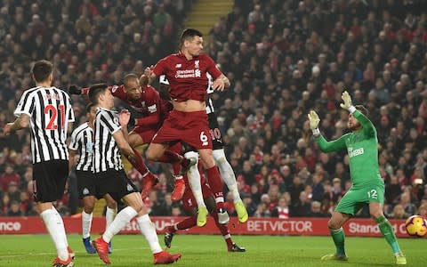 Fabinho scores Liverpool's fourth goal to wrap up the win - Credit: Getty images
