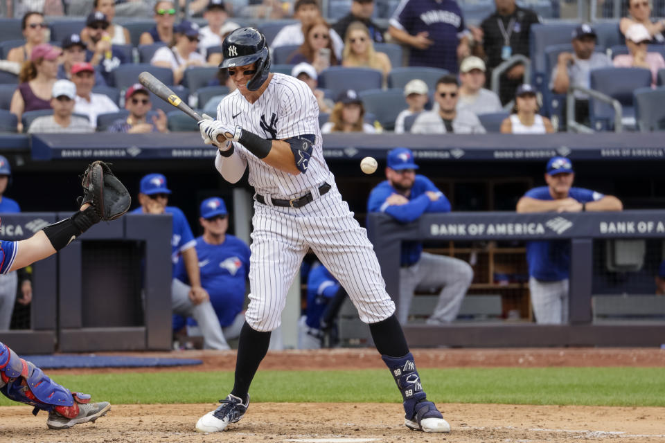 New York Yankees' Aaron Judge is hit with a pitch during the fifth inning of a baseball game against the Toronto Blue Jays, Sunday, Aug. 21, 2022, in New York. (AP Photo/Corey Sipkin)