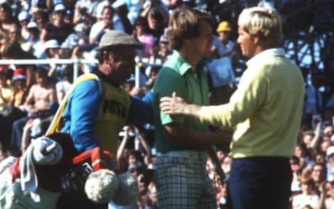 Tom Watson (centre) shakes hands with Jack Nicklaus after winning The Open at Turnberry - Credit: getty images