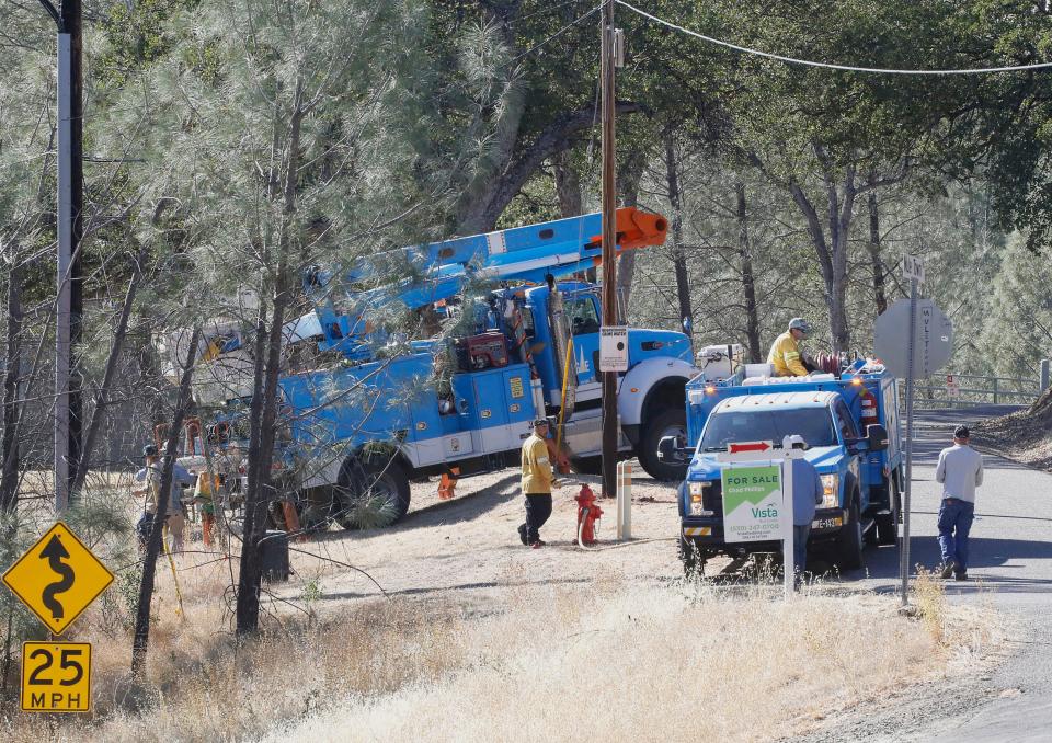 Pacific Gas and Electric crews respond to the Zogg Fire along Placer Road on Monday, Sept. 28, 2020.