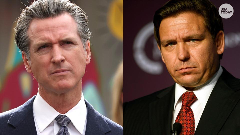 FILE: California Gov. Gavin Newsom is threatening Florida Gov. Ron DeSantis with legal action for sending migrants to other states.