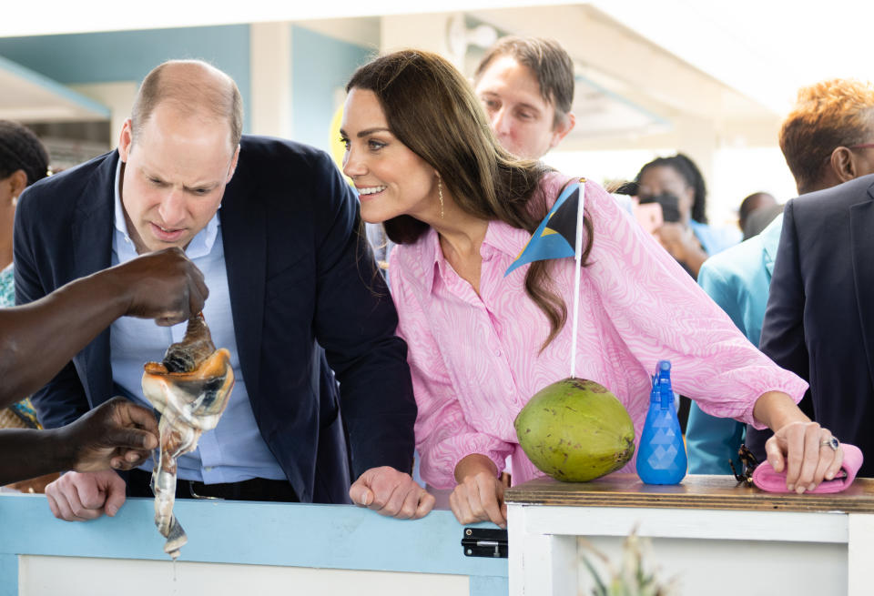 GREAT ABACO, BAHAMAS - MARCH 26: Prince William, Duke of Cambridge and Catherine, Duchess of Cambridge have a conch prepared for them during a visit to Abaco on March 26, 2022 in Great Abaco, Bahamas. Abaco was dramatically hit by Hurricane Dorian which saw winds of up to 185mph and left devastation in its wake. Their Royal Highnesses are learning about the impact of the hurricane and see how communities are still being rebuilt more than two years on. (Photo by Samir Hussein - Pool/WireImage)