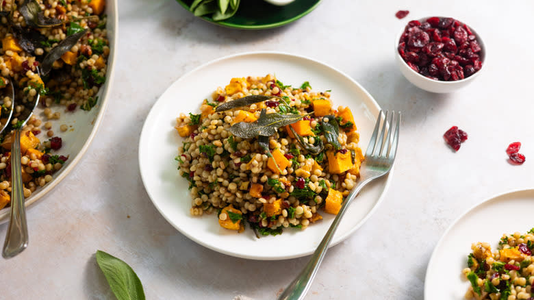 Cranberry and sage pearl couscous on plate 