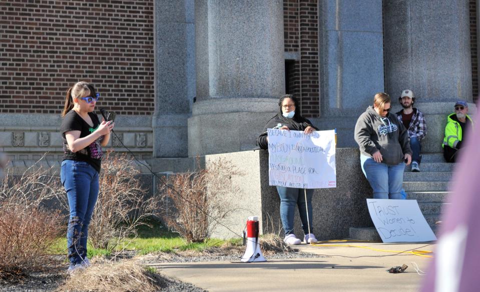 Chantal Oechsle addresses a group of pro-choice advocates Tuesday, May 3, 2022, outside the Stearns County Court House in St. Cloud.