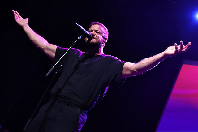 <p>John Lamparski/Getty</p> Dan Reynolds performing in New York City in June 2024.