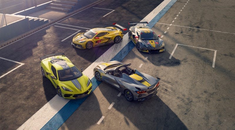 an overhead photo of four C8 corvettes. at top, two corvette race cars, at bottom two street-legal corvettes wearing the commemorative championship-edition decal set that was offered for the 2022 model year