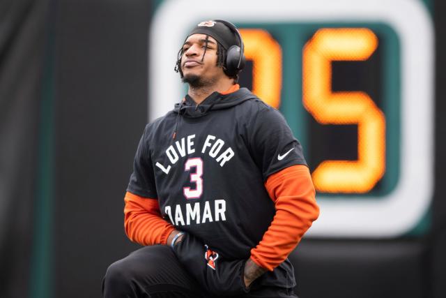 Cincinnati Bengals wide receiver Ja'Marr Chase (1) wears a shirt honoring  injured Buffalo Bills player Damar Hamlin before an NFL football game  against the Baltimore Ravens in Cincinnati, Sunday, Jan. 8, 2023. (