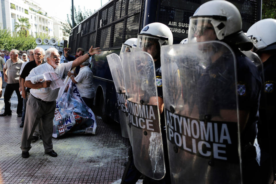 A pensioner protests in Athens, Greece