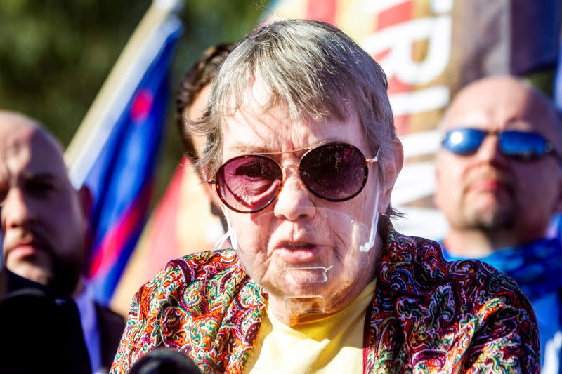 Jill Stokke, who says she was denied her vote, speaks during a Trump campaign press conference outside the Clark County Election Center in North Las Vegas