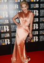 BRIT Awards 2013: Rita Ora opted for a peach satin gown with contrasting red lips at the event ©Getty