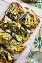 <p>Adding ricotta and grilled veggies brings this classic dish up from an appetizer to a main course.</p><p><em><a href="https://www.womansday.com/food-recipes/food-drinks/a22469348/grilled-squash-garlic-bread-recipe/" rel="nofollow noopener" target="_blank" data-ylk="slk:Get the Grilled Squash Garlic Bread recipe.;elm:context_link;itc:0;sec:content-canvas" class="link ">Get the Grilled Squash Garlic Bread recipe.</a></em></p>