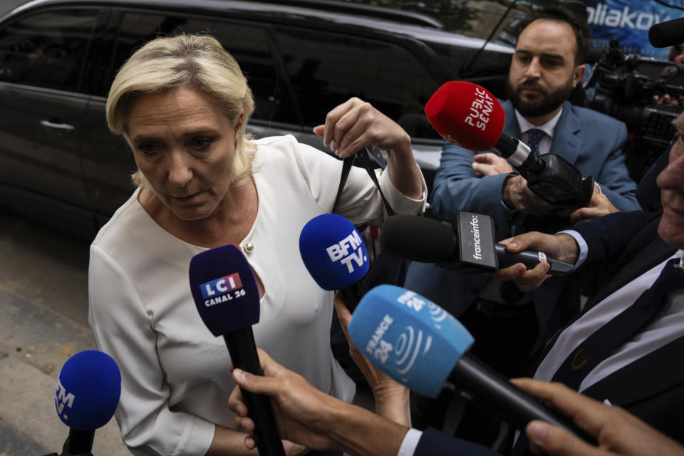 Marine Le Pen, leader the French far-right, arrives at the National Rally party headquarters, Monday, July 1, 2024 in Paris. France's National Rally surged into the lead in the first round of legislative elections, according to results released early Monday, bringing the far-right party to the brink of power and dealing a major blow to President Emmanuel Macron's centrists in an election that could set the country, and Europe, on a starkly different course. (AP Photo/Louise Delmotte)