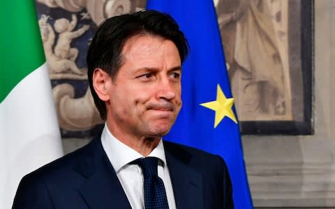 Italy's Prime minister candidate Giuseppe Conte leaves after a meeting with Italy's President Sergio Mattarella on May 27 - Credit:  VINCENZO PINTO/AFP