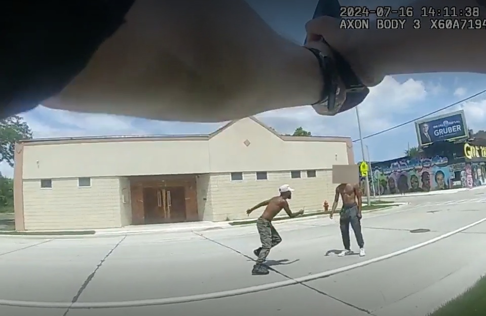 A screengrab from Ohio's Columbus Division of Police shows the moment just before officers opened fire on a Milwaukee man. Officers had ordered the man, identified as Samuel Sharpe Jr. by a relative, to drop two knives he was holding.