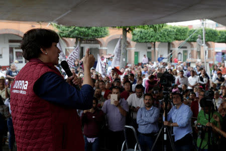 Delfina Gomez of the National Regeneration Movement (MORENA), candidate for the governor of the State of Mexico, addresses the audience during her electoral campaign in Metepec, State of Mexico, Mexico May 16, 2017. Picture taken on May 16, 2017. REUTERS/Carlos Jasso