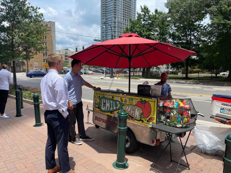 The famous Chili Man hot dog stand in Uptown is known for their chili hot dogs.