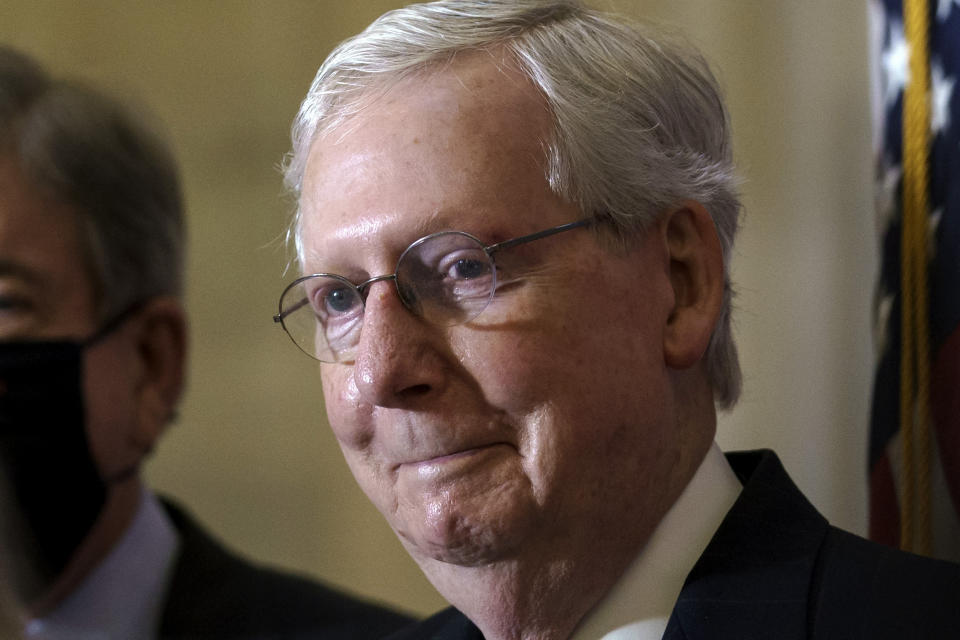 Senate Majority Leader Mitch McConnell, R-Ky., pauses as he talks to reporters after the Republican Conference held leadership elections, on Capitol Hill in Washington, Tuesday, Nov. 10, 2020. (AP Photo/J. Scott Applewhite)