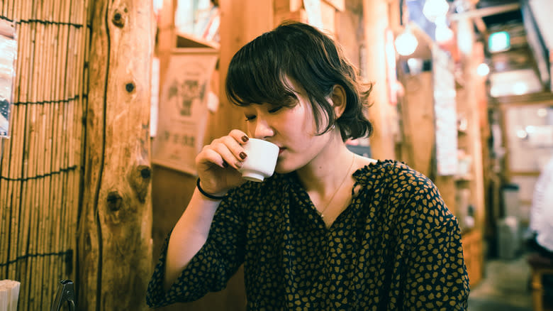 Japanese woman drinking sake 