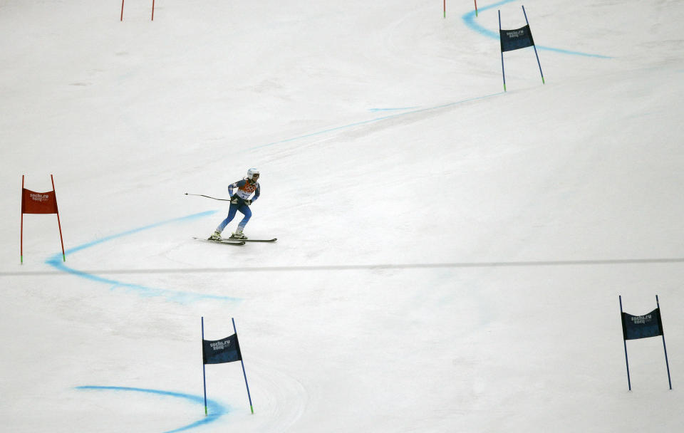 United States' Julia Mancuso skis out of the first run of the women's giant slalom at the Sochi 2014 Winter Olympics, Tuesday, Feb. 18, 2014 in Krasnaya Polyana, Russia. (AP Photo/Christophe Ena)