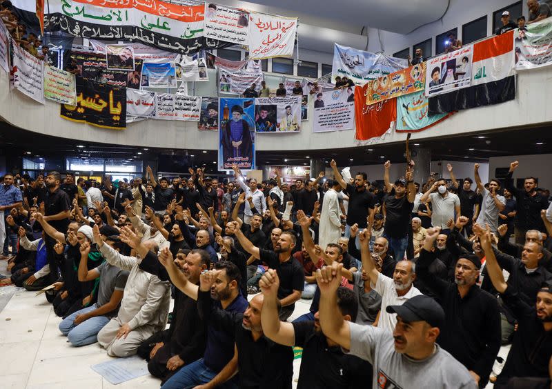 Supporters of Iraqi populist leader Moqtada al-Sadr gather for a sit-in at the parliament building, amid political crisis