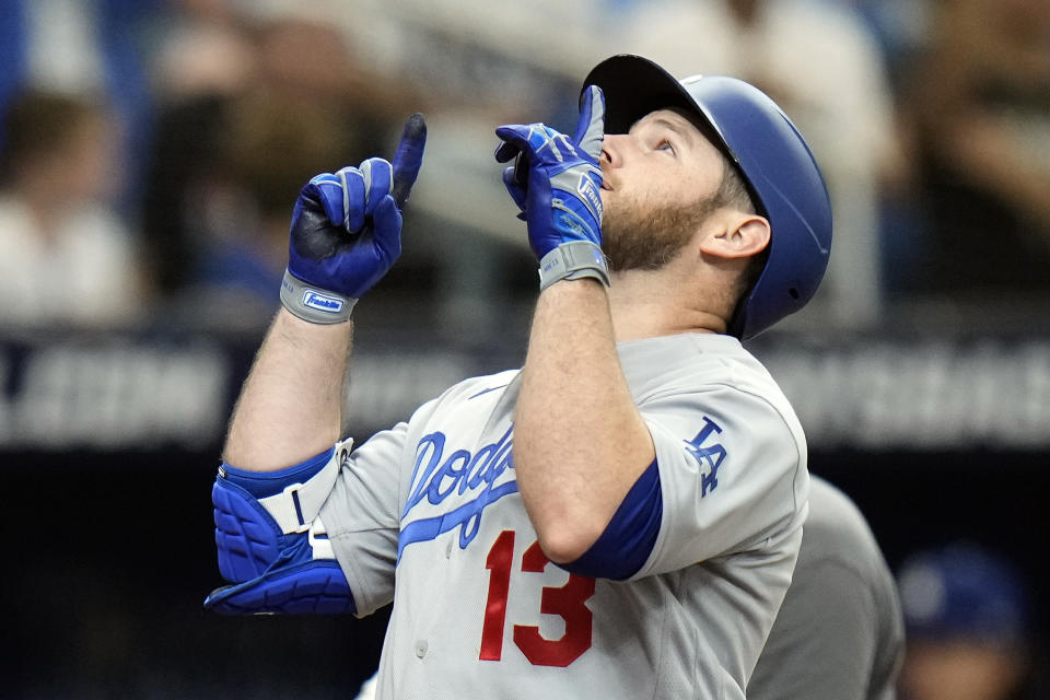 Los Angeles Dodgers' Max Muncy celebrates his solo home run off Tampa Bay Rays pitcher Tyler Glasnow during the second inning of a baseball game Saturday, May 27, 2023, in St. Petersburg, Fla. (AP Photo/Chris O'Meara)