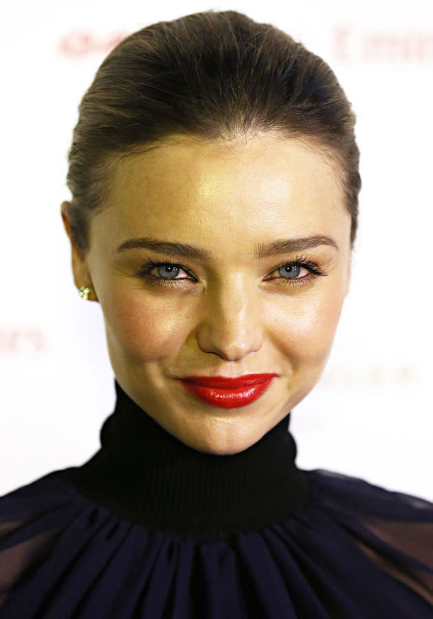 Celebrities wearing red lipstick: Miranda Kerr [Splash]