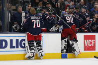 Columbus Blue Jackets' Elvis Merzlikins (90), of Latvia, leaves an NHL hockey game after being injured during the second period against the Ottawa Senators Monday, Feb. 24, 2020, in Columbus, Ohio. (AP Photo/Jay LaPrete)