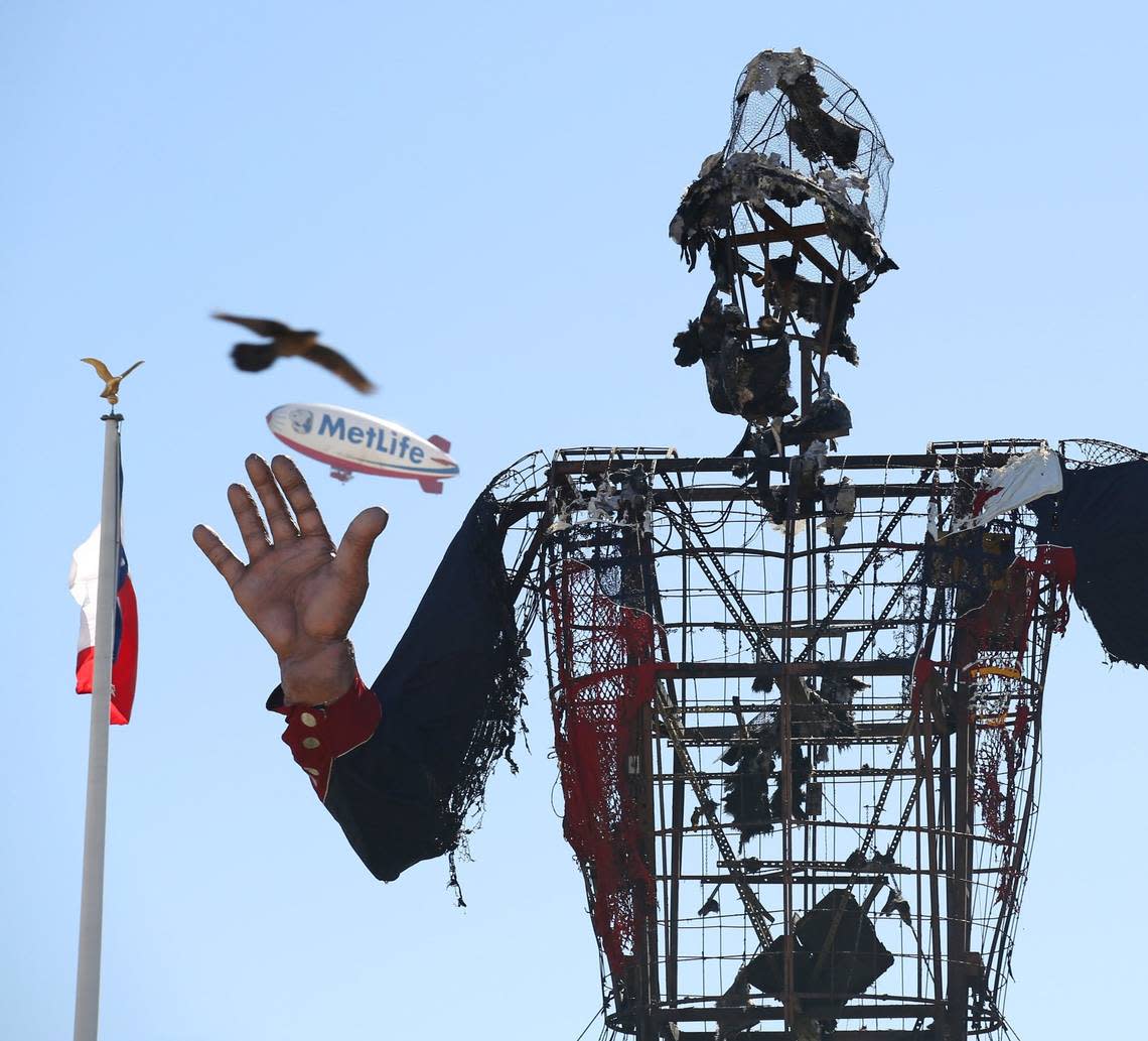 The remains of Big Tex after a fire took him down to the frame at the State Fair of Texas in Fair Park, on Friday, October 19, 2012