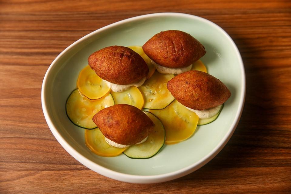 Kibbeh gets a zucchini facelift with three elements of zucchini from fresh sliced, pickled and in a puree form.