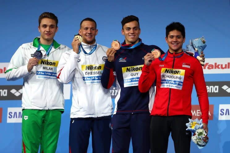 BUDAPEST, HUNGARY – JULY 29: (L-R) Silver medalist Kristof Milak of Hungary, gold medalist Caeleb Remel Dressel of the United States and bronze medalists James Guy of Great Britain and Joseph Schooling of Singapore pose with the medals won during the Men’s 100m Butterfly final on day sixteen of the Budapest 2017 FINA World Championships on July 29, 2017 in Budapest, Hungary. (Photo by Clive Rose/Getty Images)