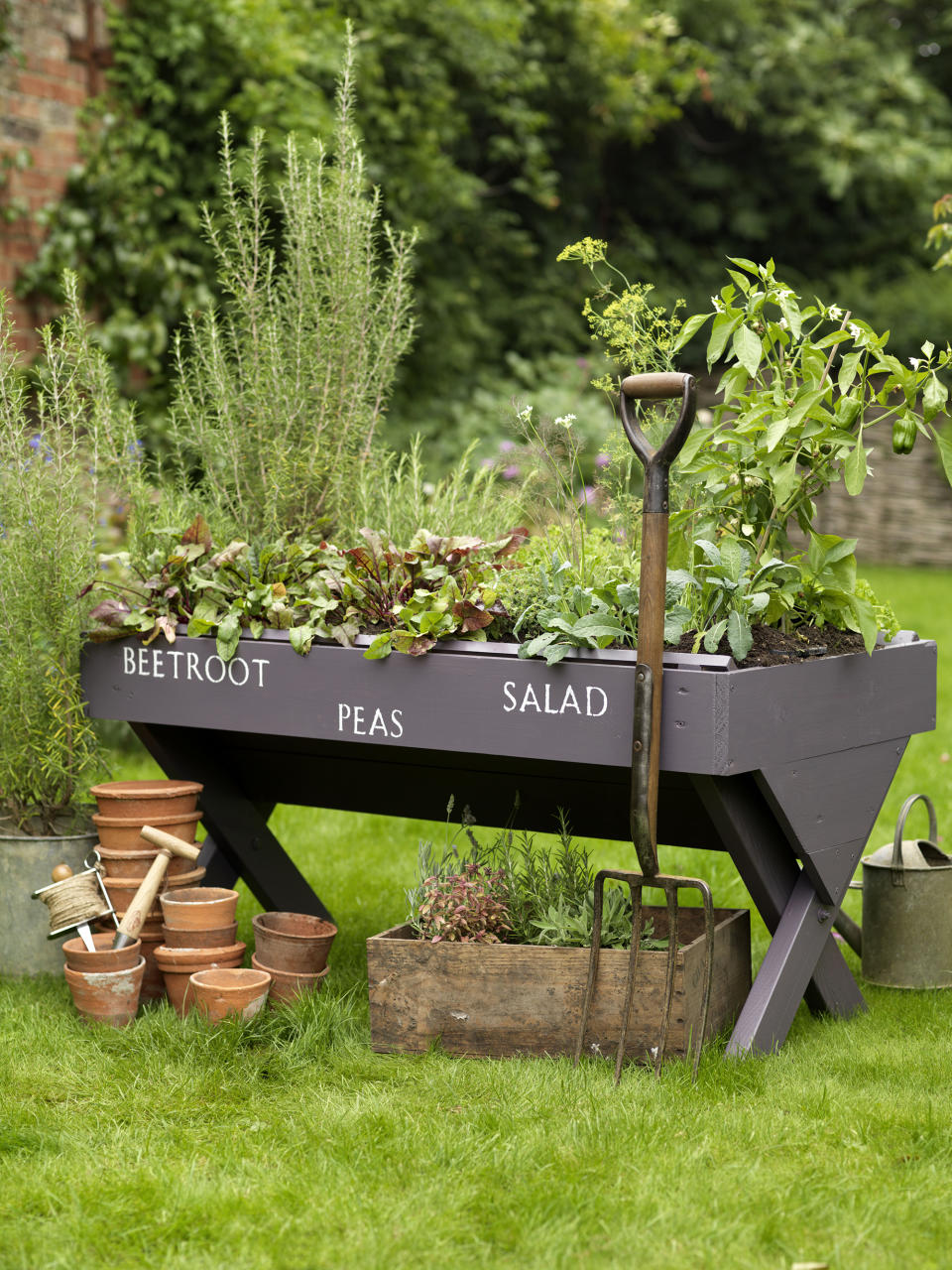 ADD A TROUGH PLANTER FOR A COMPACT AND PRACTICAL GARDEN IDEA