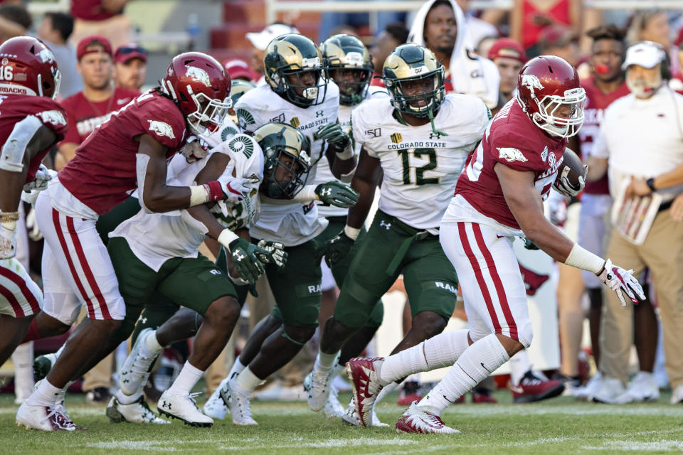 FAYETTEVILLE, AR - SEPTEMBER 14: Cheyenne OGrady #85 of the Arkansas Razorbacks breaks numerous tackles and runs for a touchdown during a game against the Colorado State Rams at Razorback Stadium on September 14, 2019 in Fayetteville, Arkansas. The Razorbacks defeated the Rams 55-34. (Photo by Wesley Hitt/Getty Images)