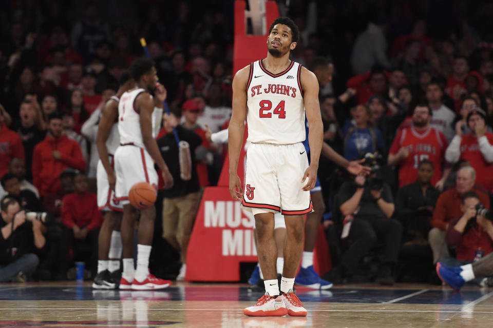 St. John's guard Nick Rutherford (24) reacts after a call during the second half of an NCAA college basketball game against Seton Hall in New York, Saturday, Jan. 18, 2020. (AP Photo/Sarah Stier)