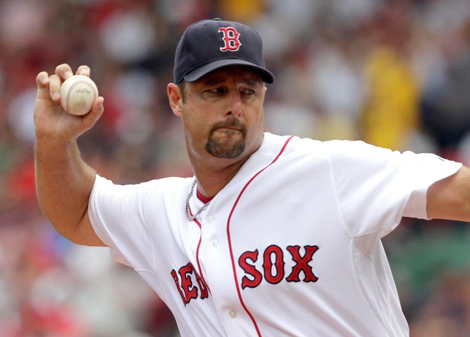 BOSTON, MA  - JULY 24:  Tim Wakefield #49 of the Boston Red Sox throws a knuckleball against the Seattle Mariners at Fenway Park on July 24, 2011 in Boston, Massachusetts.  (Photo by Jim Rogash/Getty Images)