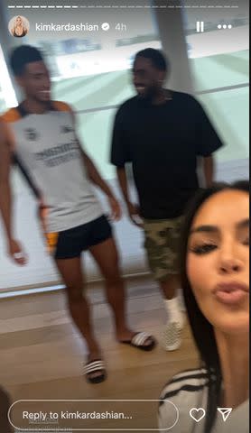 <p>Kim Kardashian/Instagram</p> Kim Kardashian poses in a selfie with soccer player Jude Bellingham in the background.