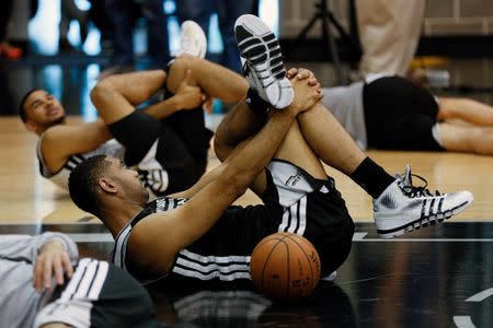 Jun 6, 2014; San Antonio, TX, USA; San Antonio Spurs guard Tony Parker (9) warms up during basketball practice at Spurs Practice Facility. Mandatory Credit: Soobum Im-USA TODAY Sports