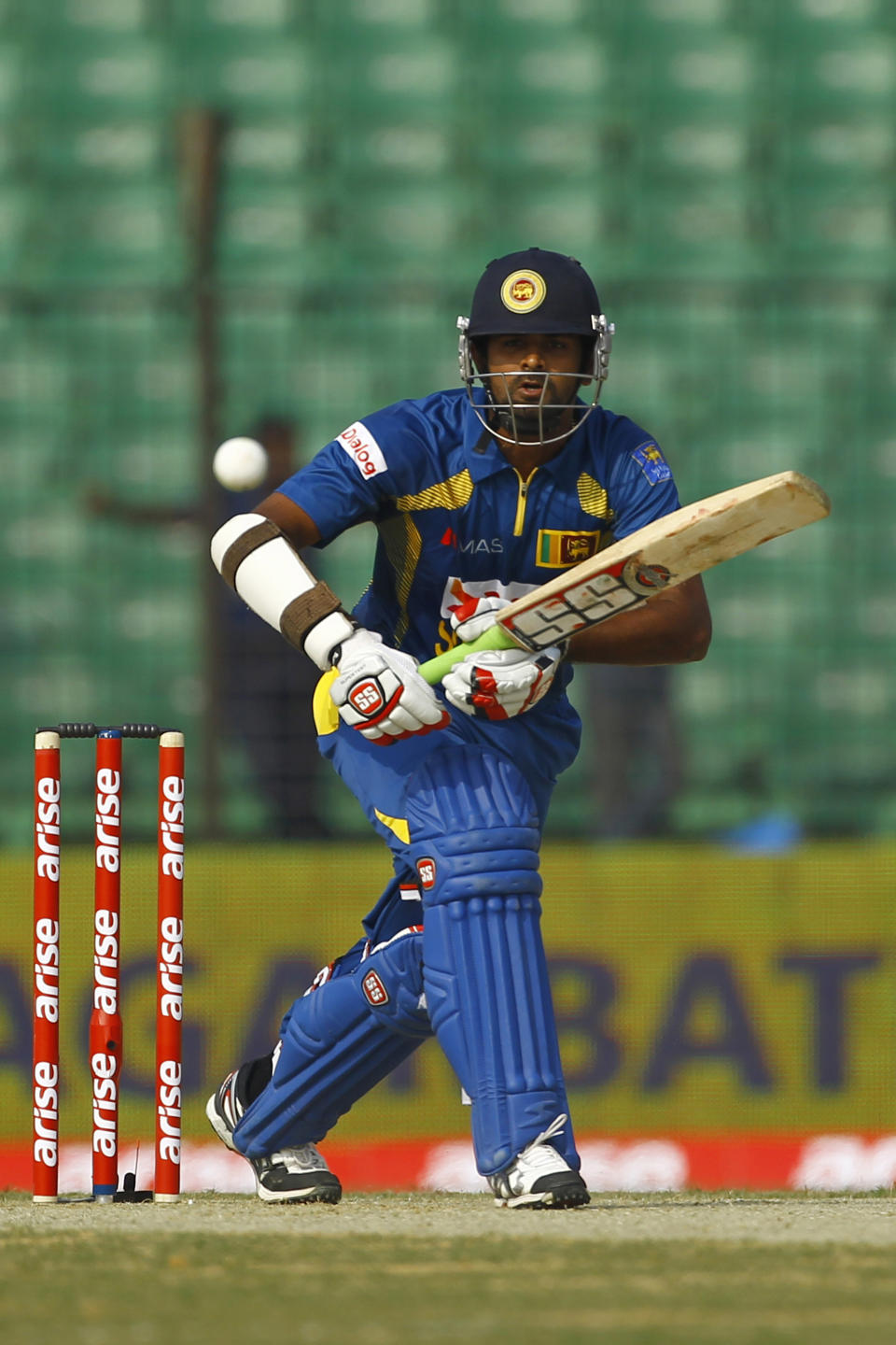 Sri Lanka’s Lahiru Thirimanne plays a shot during the opening match of the Asia Cup one-day international cricket tournament against Pakistan in Fatullah, near Dhaka, Bangladesh, Tuesday, Feb. 25, 2014. (AP Photo/A.M. Ahad)