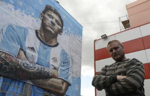 A larger-than-life version of Lionel Messi greets passers-by in Bronnitsy