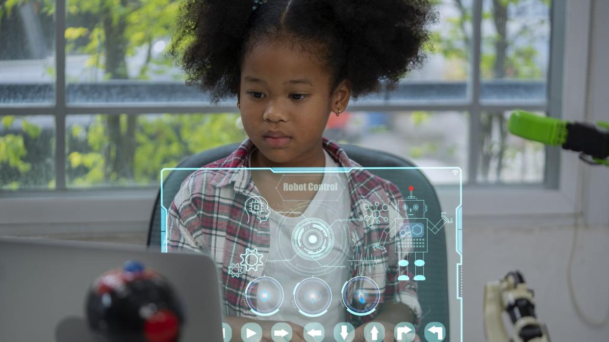 a girl thinking and analyzing a robot program