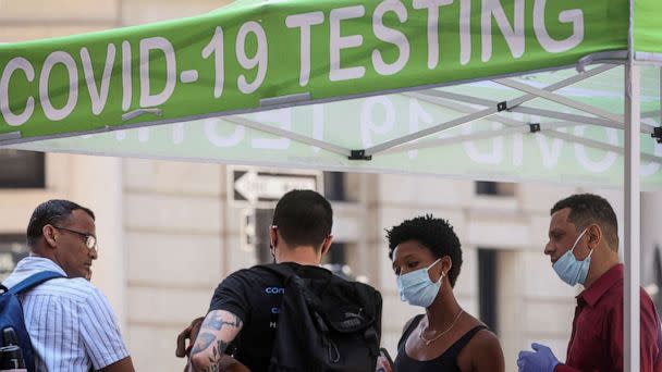 PHOTO: People wait to take coronavirus disease (COVID-19) tests at a pop-up testing site in New York City, July 11, 2022. (Brendan Mcdermid/Reuters)