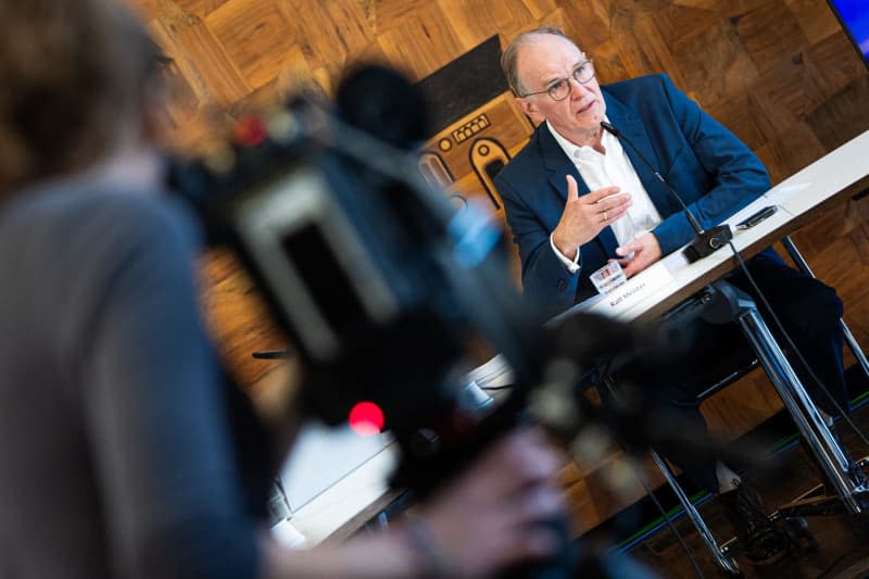 Ralf Meister, Bishop of the Evangelical Lutheran Church in Hanover, speaks during a press conference on an independent report on sexualized violence in the Protestant parish of Oesede. Moritz Frankenberg/dpa