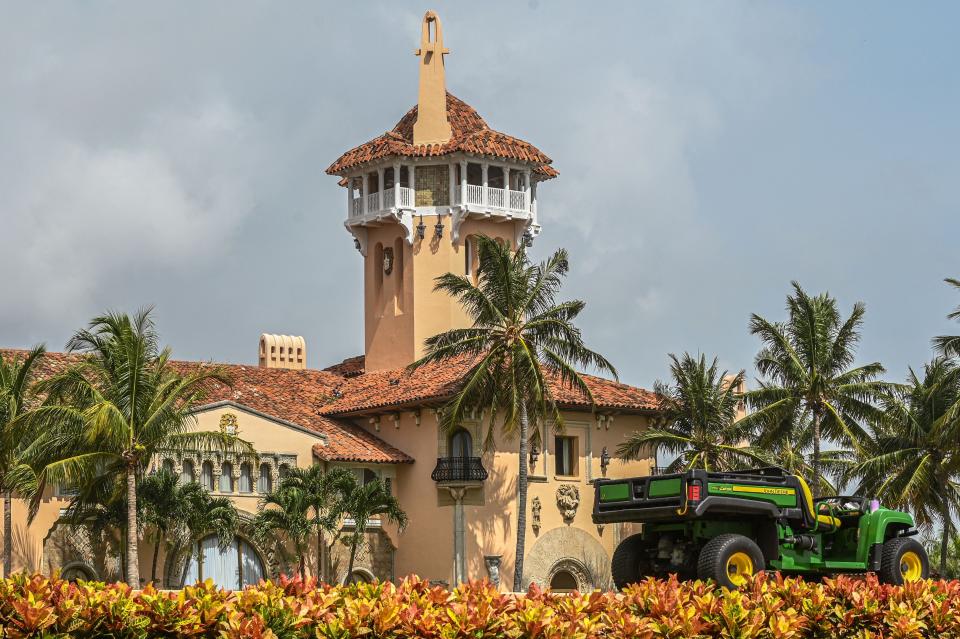 Former US President Donald Trump's residence in Mar-A-Lago, Palm Beach, Florida on August 9, 2022. - Former US president Donald Trump said August 8, 2022 that his Mar-A-Lago residence in Florida was being &quot;raided&quot; by FBI agents in what he called an act of &quot;prosecutorial misconduct.&quot;